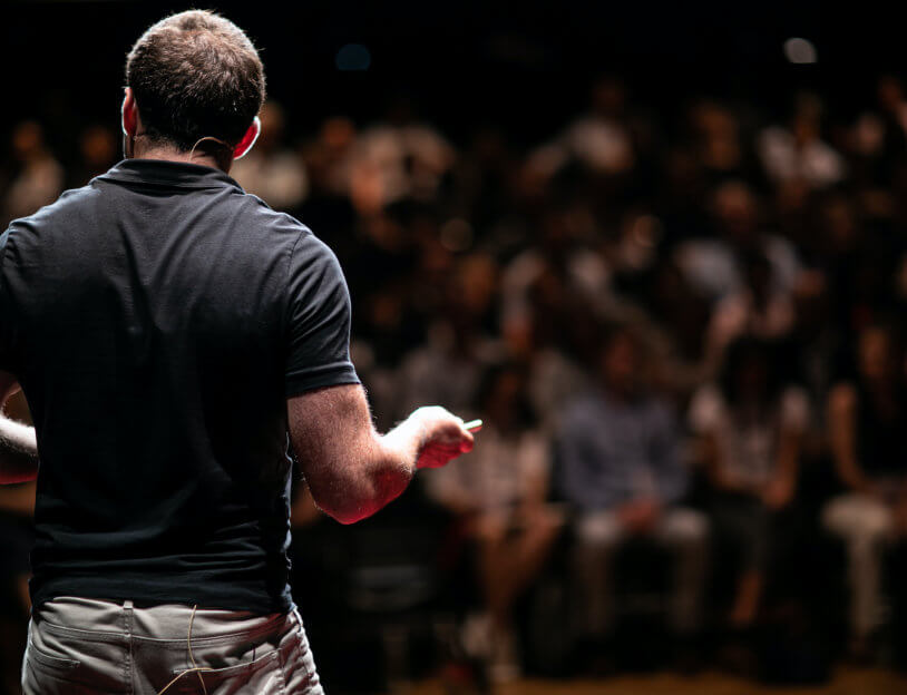 Man speaking to Crowd